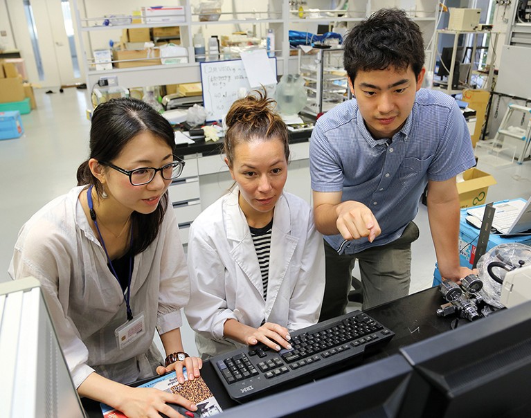 Image of three researchers at Tokyo Tech.