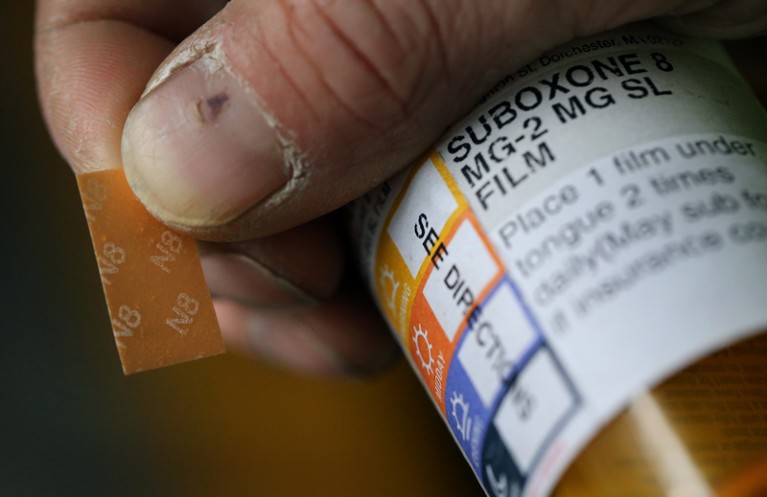A patient holding a Suboxone prescription