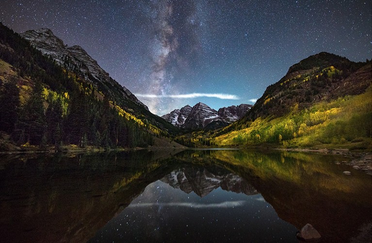 The Milky Way illuminates the Marron Bells near Aspen, Colorado
