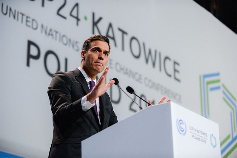 Pedro Sanchez, PM of Spain, speaks at a podium during COP24 in Poland this year.