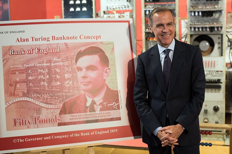 Mark Carney, governor of the Bank of England, beside the concept design for the new fifty pound banknote