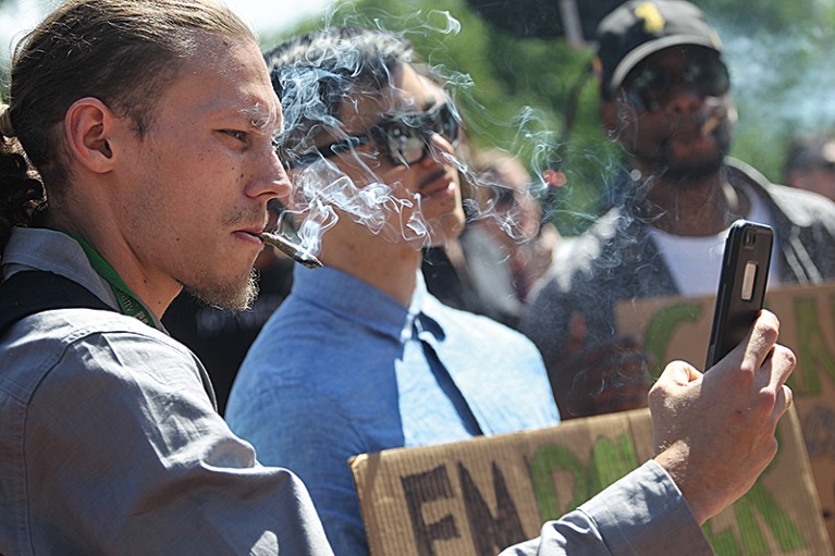 Campaigners smoke cannabis at a rally in Boston, Massachusetts