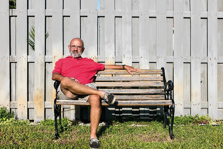 Len Barbieri sits outside on a park bench