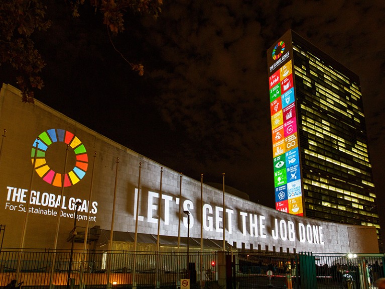 Massive projections on Sustainable Development Goals are seen on the north facade of the Secretariat building, NY.