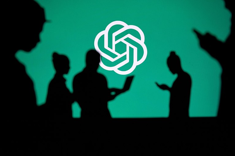 Silhouetted people with digital devices in front of the OpenAI logo.