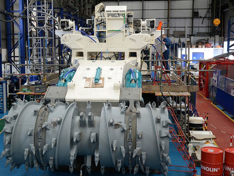 Employees of Soil Machine Dynamics (SMD) work on a subsea mining machine being built for Nautilus Minerals at Wallsend, northern England April 14, 2014.