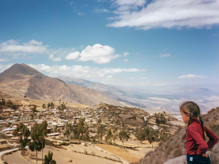 Claudia de Rham overlooking small village in Peruvian Andes near city of Ayacucho, circa 1981.