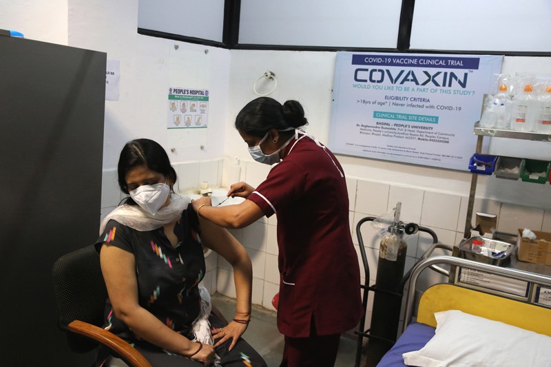 A volunteer receives a shot of India's first Covid-19 vaccine