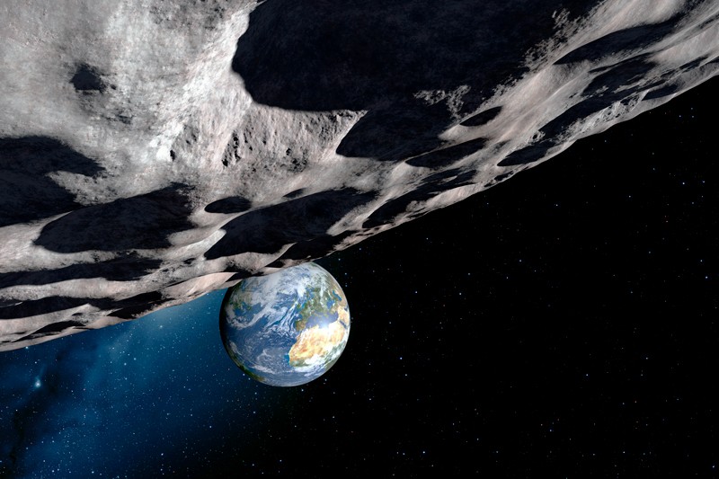 Computer artwork of an asteroid approaching Earth