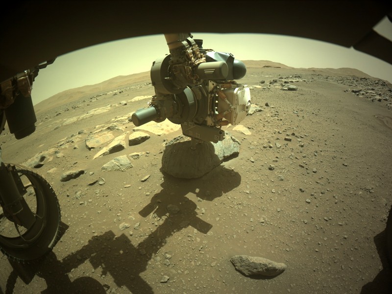 The rover drilling the hole
