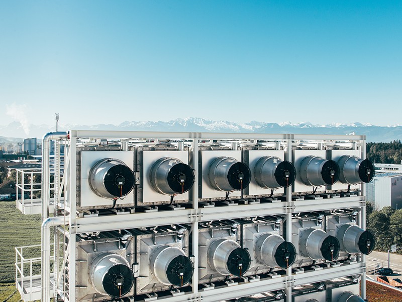 Climeworks direct air capture plant with mountains.