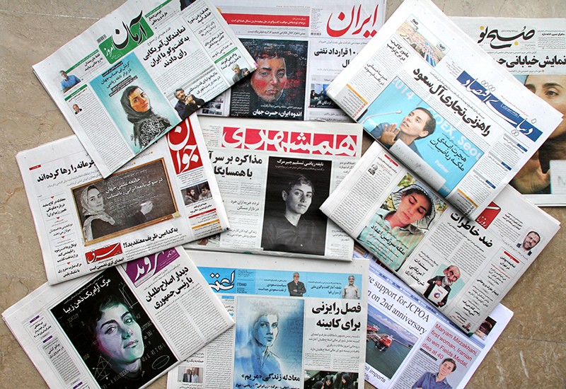 The front pages of Iranian newspapers with portraits of female scientist Maryam Mirzakhani, who won the Fields Medal in 2014.