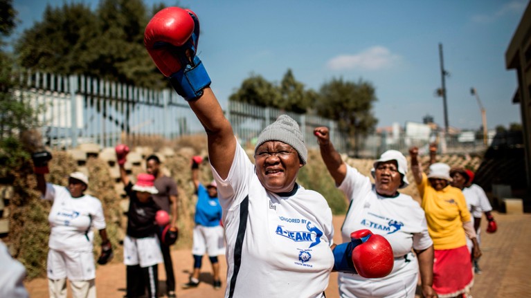 Grandmothers take part in a boxing training session