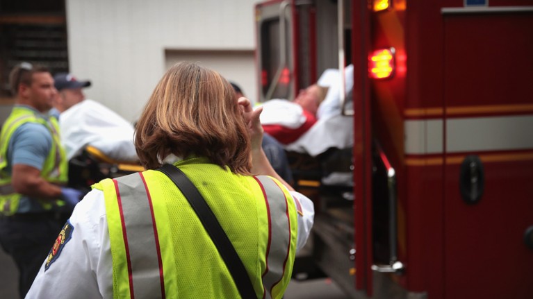 Firefighters transport an overdose victim to a hospital