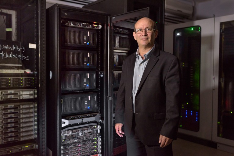 Carl Malamud poses for a portrait in from of data servers at Jawaharlal Nehru University