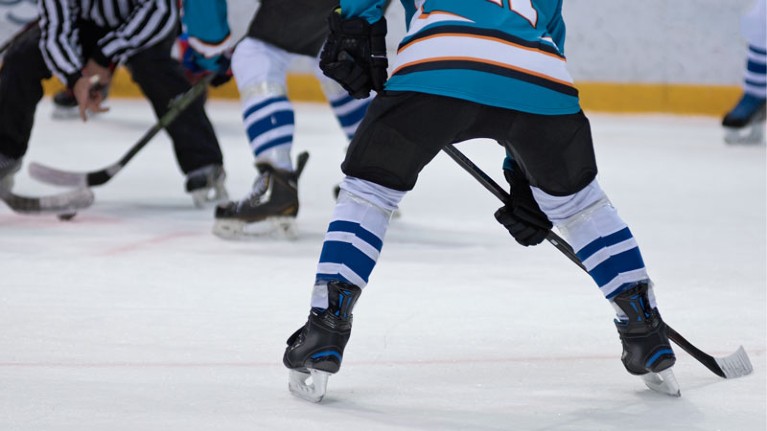 Ice-hockey players play ice hockey.