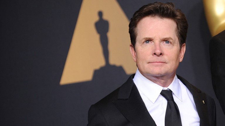 Actor Michael J. Fox poses in the press room at the 89th annual Academy Awards.
