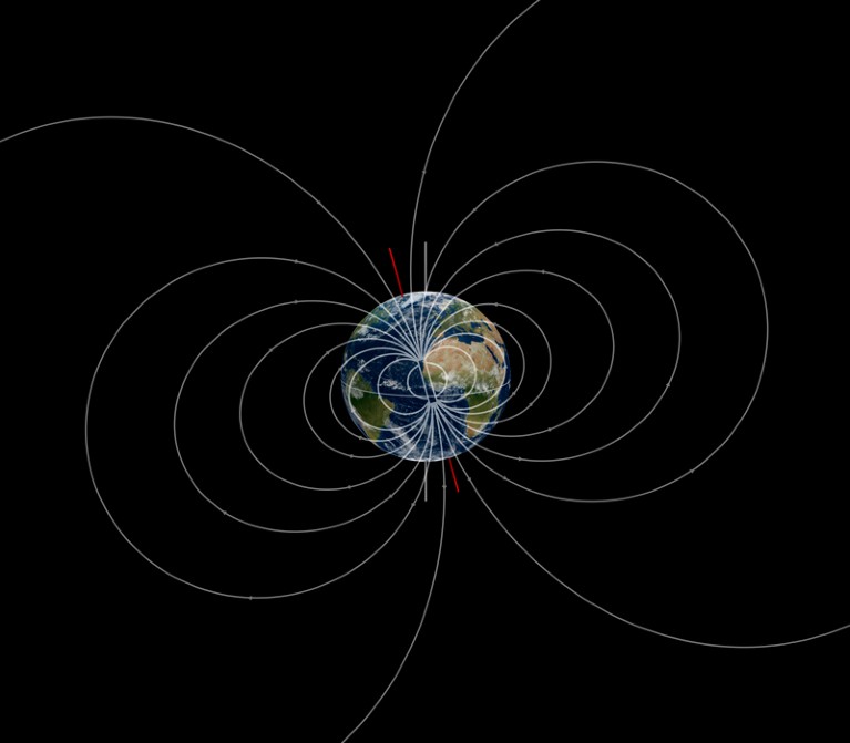 Illustration of Earth with white lines showing the magnetic field.