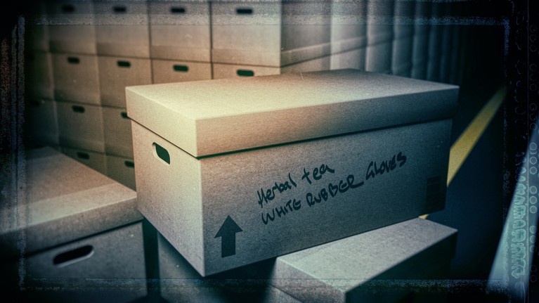 A large cardboard box bearing the words ‘herbal tea’ and ‘white rubber gloves’ sits in front of stacks of similar boxes