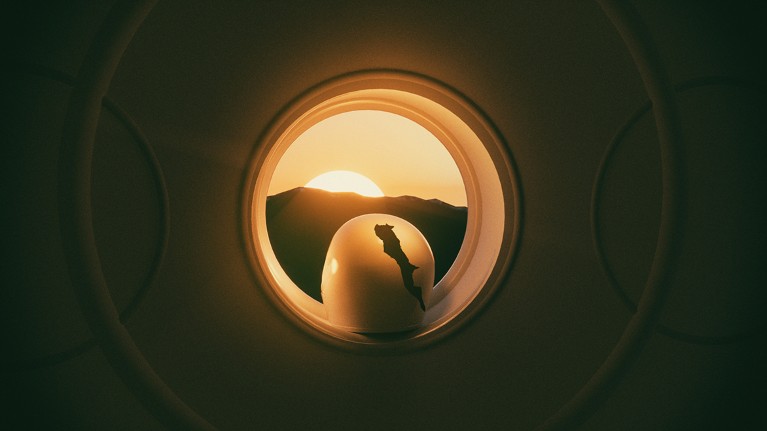 A white robot head with a large crack in it sits in a circular porthole facing the setting sun