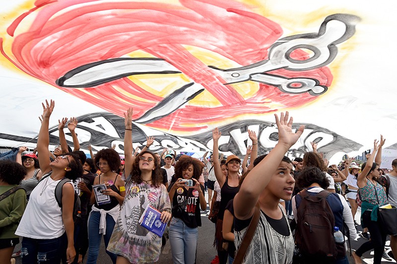 Thousands of people took to the streets of Brasilia, the capital of Brazil, to protest the budget cuts in education.