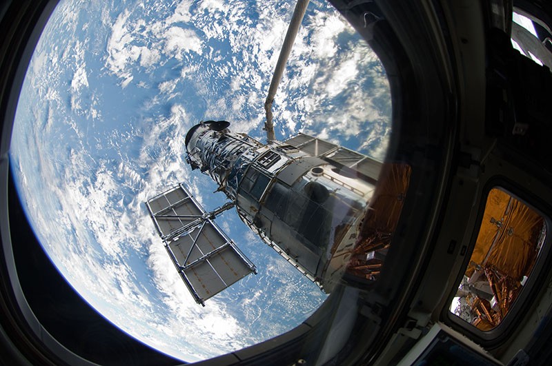 The Hubble Space Telescope following the Giant Observatory Grapple by Space Shuttle Atlantis.