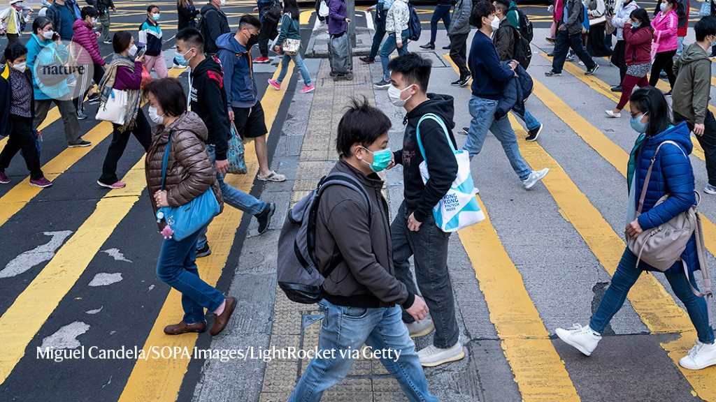 Hong Kong, China. 23rd Sep, 2021. Pedestrians walk past the