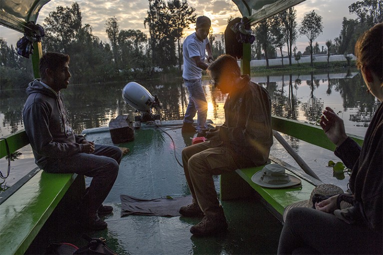 Dr Luis Zambrano and students at early morning in Xochimilco water canals, Mexico city.