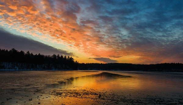 Sunset over Walden Pond in Concord, Massachusetts.