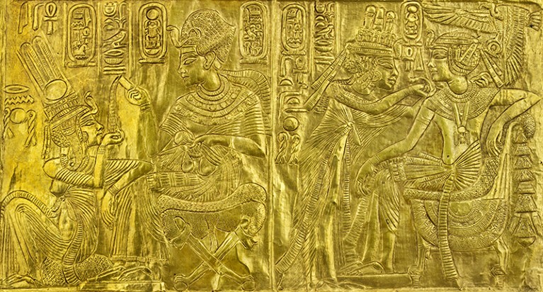 Detail from a gilded wooden shrine with scenes of Tutankhamen and Ankhesenamun.