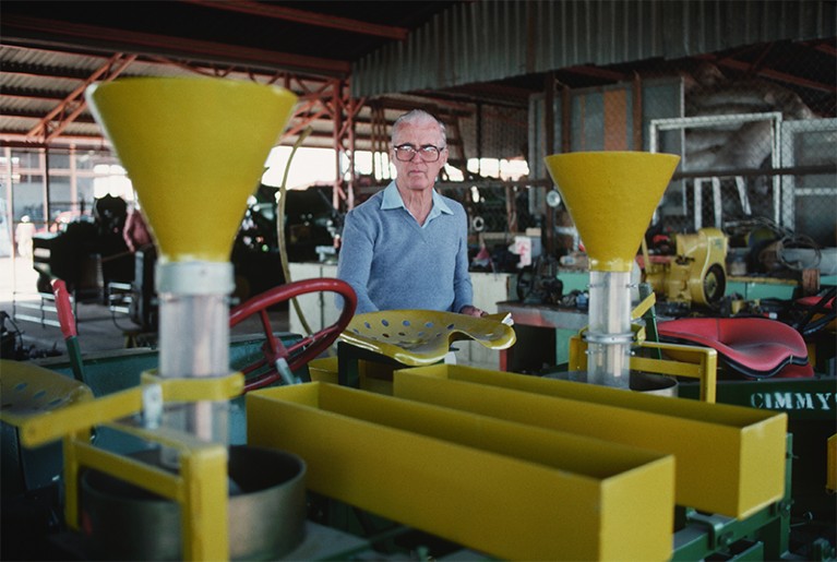 Norman Barlaug in a shed full of special farming equipment
