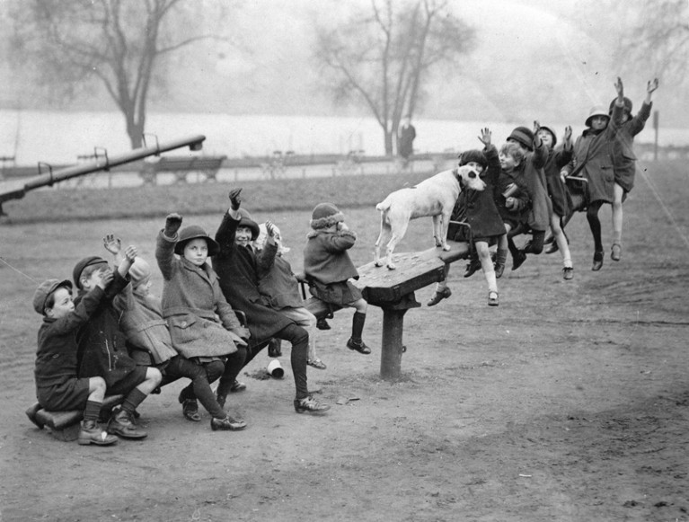 Children on a seesaw