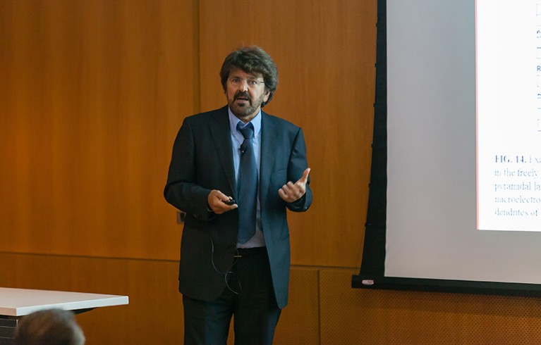 Neuroscientist Nikos Logothetis giving a lecture at the NYU Neuroscience Institute in 2014.