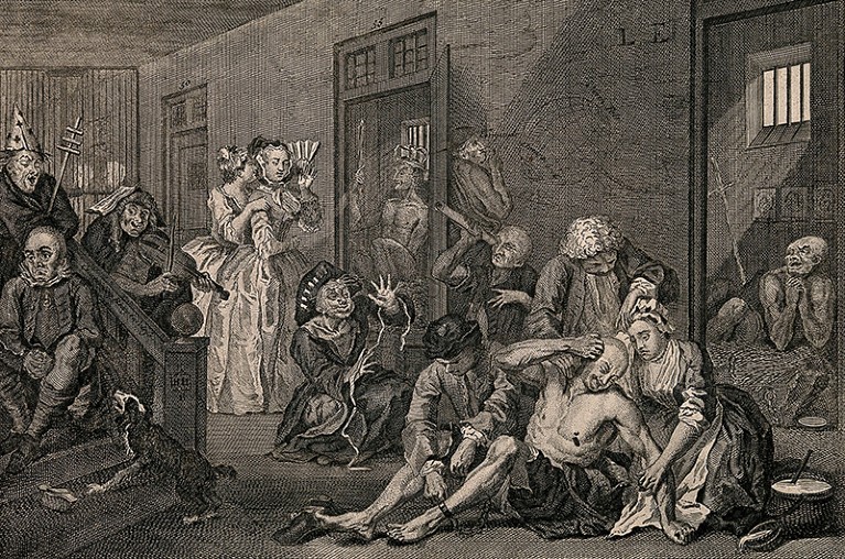 An engraving of an insane man and his crying lover at Bethlem Hospital in London by W. Hogarth, 1735.