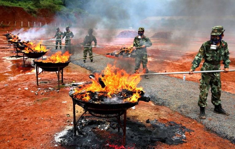 Seized drugs burned, Mangshi City, capital of Dehong Dai and Jingpo Autonomous Prefecture, Yunnan Province, China - 26 Jun 2017