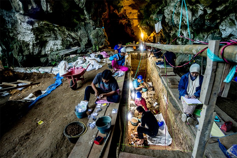 People excavating a cave in Indonesia