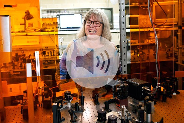 Professor Dr. Donna Strickland shows off instruments in her lab following a news conference at the University of Waterloo
