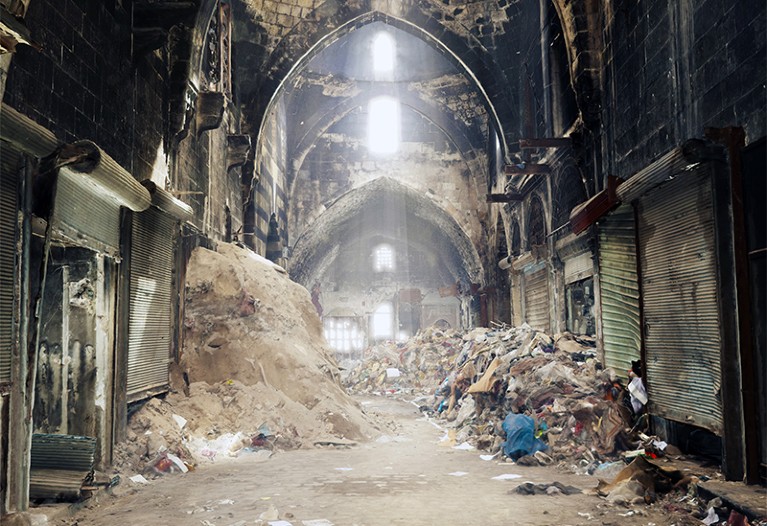 3D image of Aleppo Souk in Syria. Rubble and rubbish are on the floor, light streams in from windows in high arches