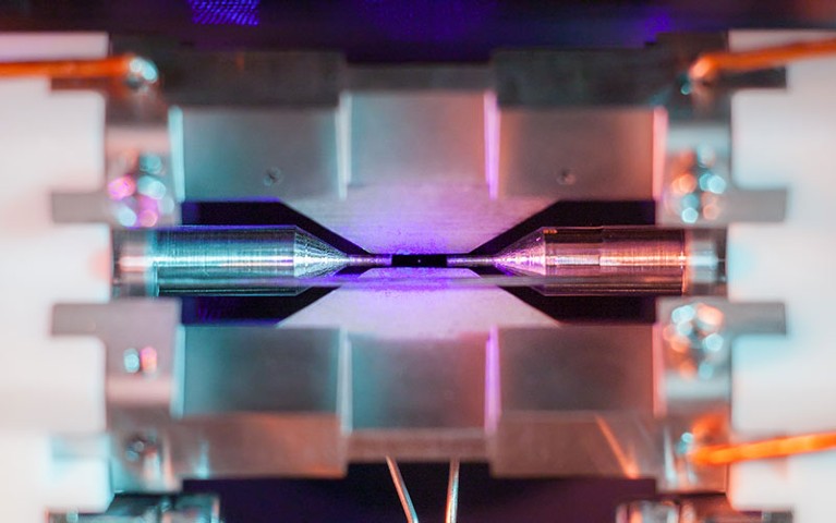 An image of a single positively-charged strontium atom, held near motionless by electric fields