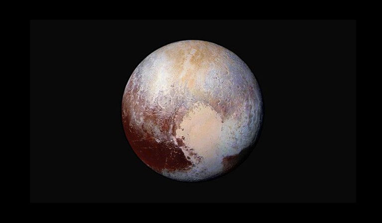 Four images from NASA's New Horizons' LORRI were combined with colour data from RALPH to create this image of Pluto