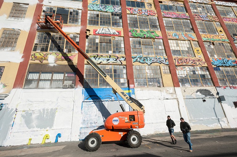 Graffiti removal at The Five Pointz building in New York City.