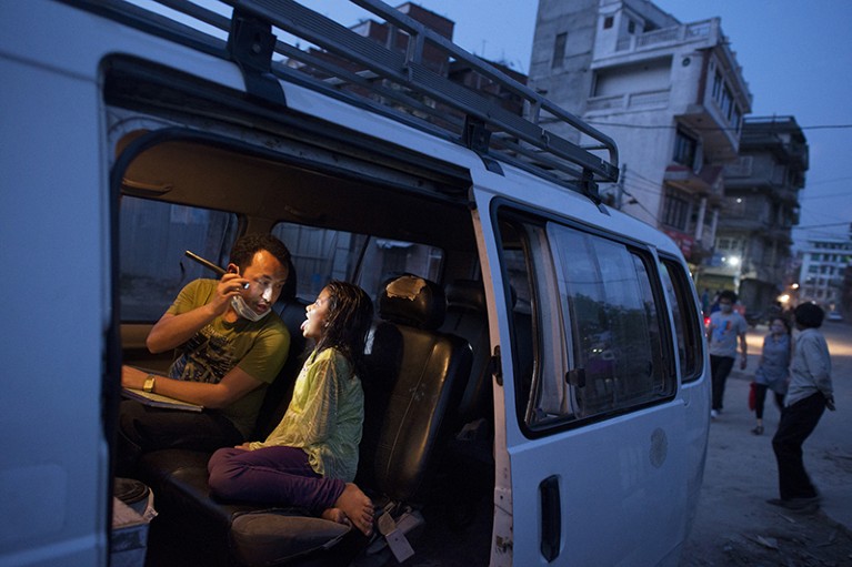 A mobile clinic van helps to support medical checks of homeless youth in Kathmandu, Nepal