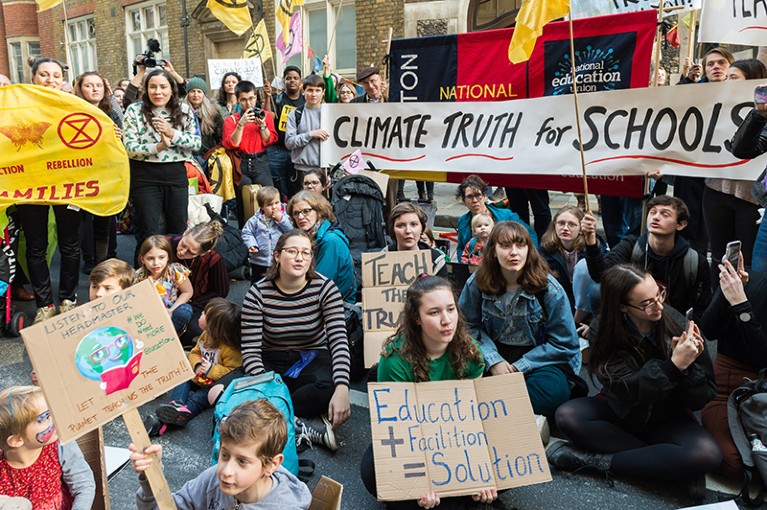 Protesters in London against inadequate climate change education.