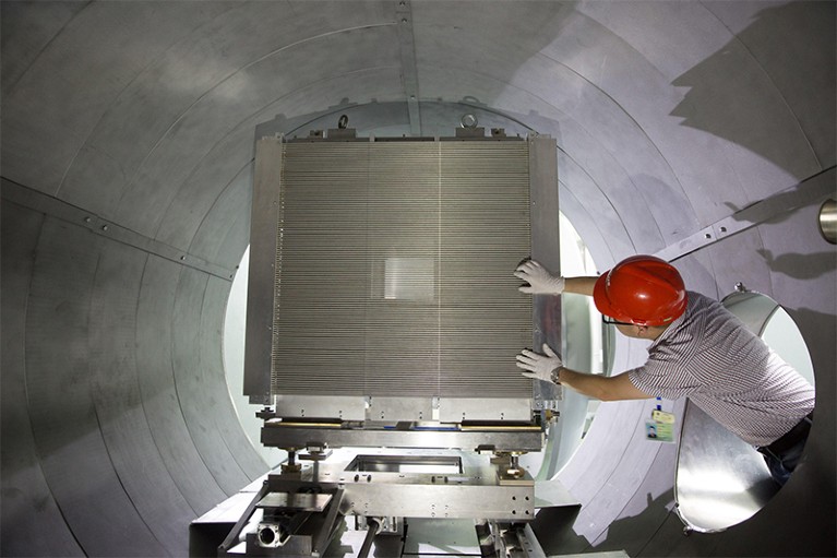 An engineer debugs an instrument at the China Spallation Neutron Source