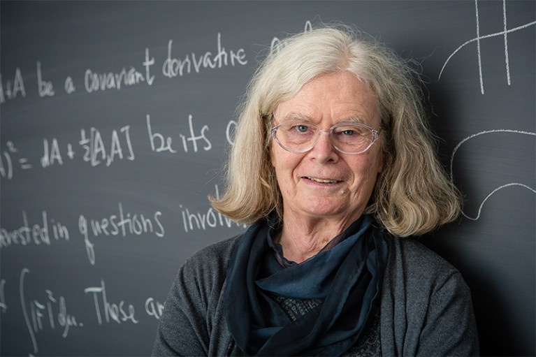 Karen Keskulla Uhlenbeck, winner of the Abel prize, photographed in front of a blackboard