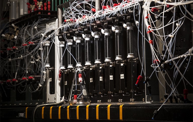 Close up view of dials and wires on Marty Burke’s synthesis machine which assembles complex molecules robotically.