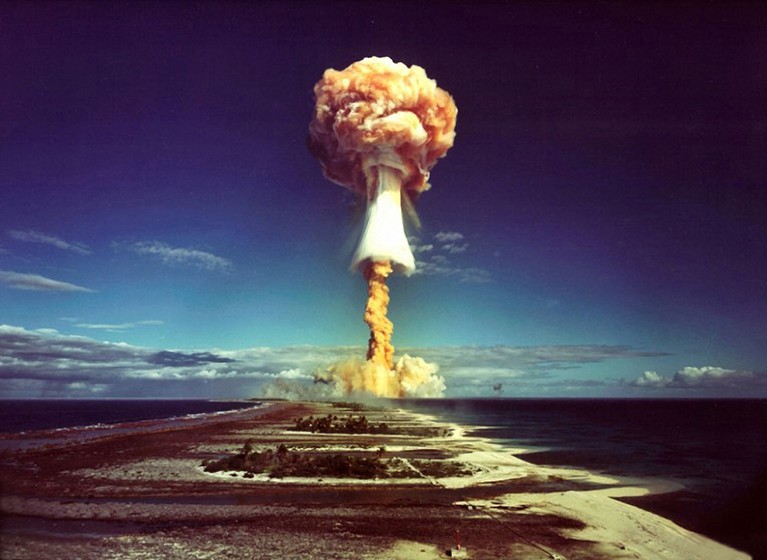 A mushroom cloud after the explosion of a French atomic bomb above the atoll of Mururoa