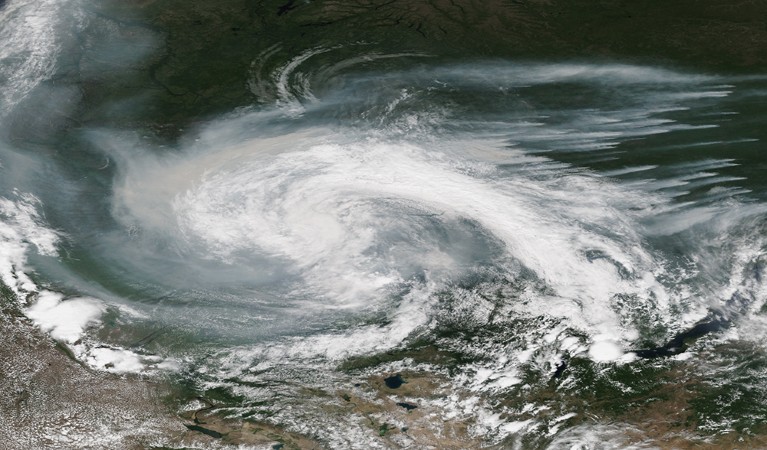 Satellite image of Wildfire Smoke Trapped in Low Pressure System Over Russia