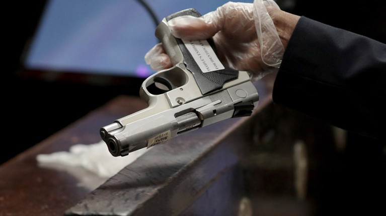 Jason Van Dyke's pistol, used in the killing of Laquan McDonald, is shown during the trial in Chicago