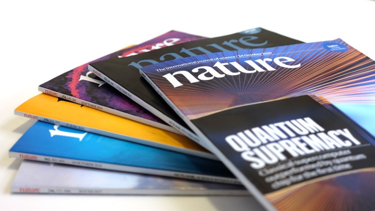 A stack of Nature journals